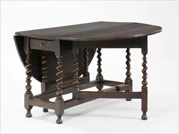 Table. Oval oak gateleg table made from oak, elm
