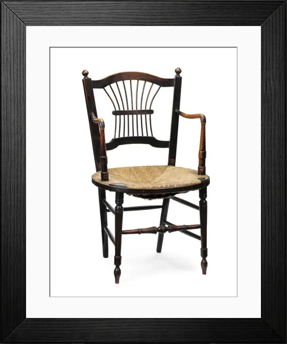 Framed Print : Armchair. Rossetti armchair, ebonised wood with rush seat Framed Print : Armchair. Rossetti armchair, ebonised wood with rush seat