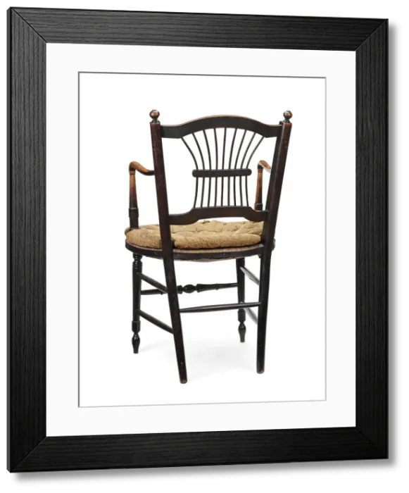 Framed Print : Armchair. Rossetti armchair, ebonised wood with rush seat Framed Print : Armchair. Rossetti armchair, ebonised wood with rush seat