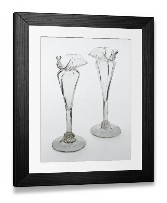 Framed Print : Vases. One of two clear glass vases with a spreading foot Framed Print : Vases. One of two clear glass vases with a spreading foot