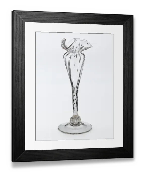 Framed Print : Vase. One of two clear glass vases with a spreading foot Framed Print : Vase. One of two clear glass vases with a spreading foot