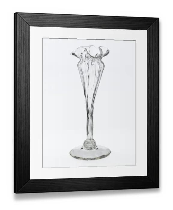 Framed Print : Vase. One of two clear glass vases with a spreading foot Framed Print : Vase. One of two clear glass vases with a spreading foot