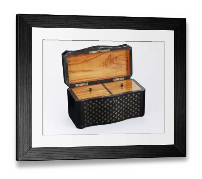 Framed Print : Tea caddy made from ebonised wood inlaid with brass quatrefoils, lined with tulipwood Framed Print : Tea caddy made from ebonised wood inlaid with brass quatrefoils, lined with tulipwood