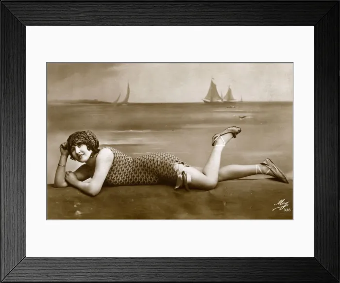 Framed Print : Pretty French girl in fishscale swimsuit reclining Framed Print : Pretty French girl in fishscale swimsuit reclining