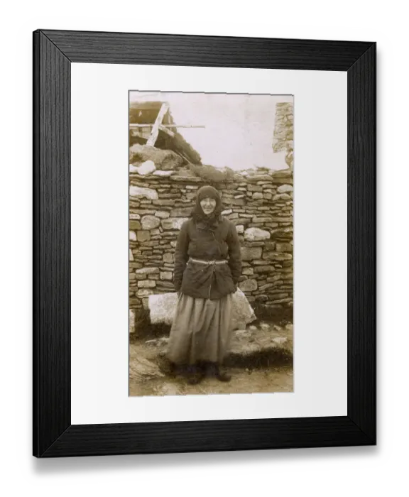 Framed Print : A Local Woman of the Orkney Islands outside her house Framed Print : A Local Woman of the Orkney Islands outside her house