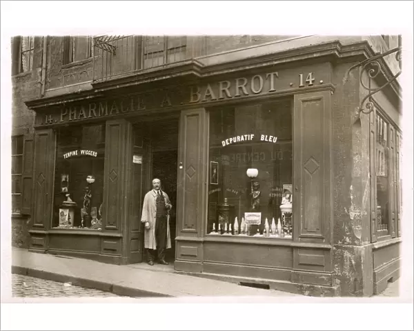 Paris, France - A. Barrot standing outside his Chemist Shop
