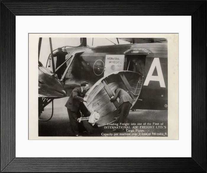 Framed Print : Loading a small boat into a Cargo Plane Framed Print : Loading a small boat into a Cargo Plane