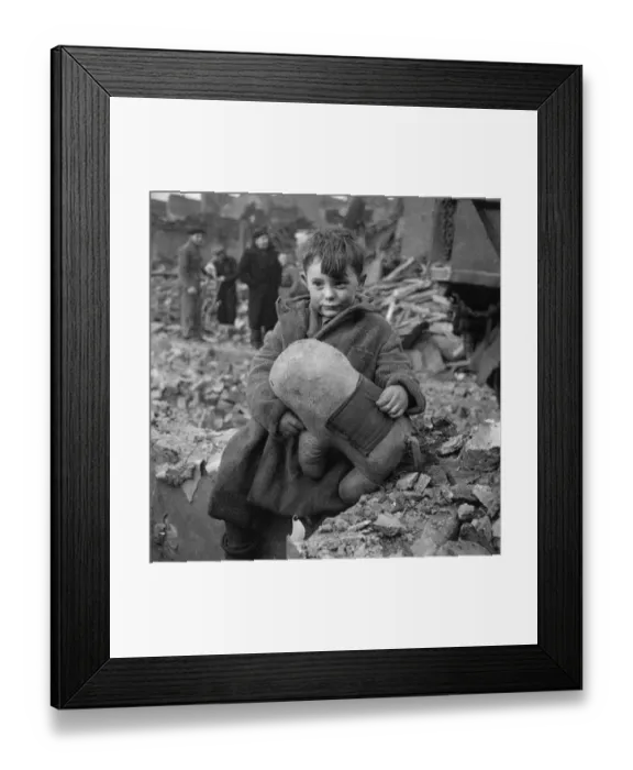 Framed Print : WW2 - Home Front - Young Blitz victim with his cuddly Toy Framed Print : WW2 - Home Front - Young Blitz victim with his cuddly Toy