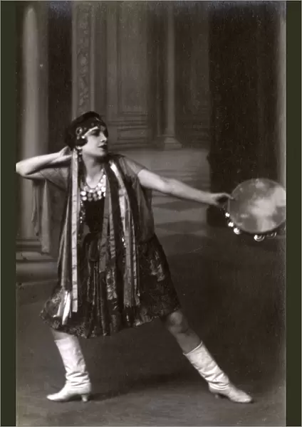 Italian Dancer with white leather boots and tamborine