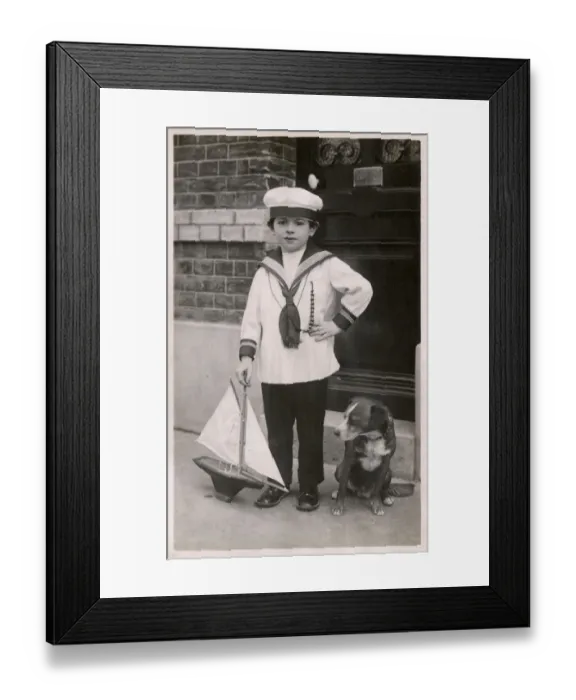 Framed Print : Young lad in sailor suit with pet dog and model ship