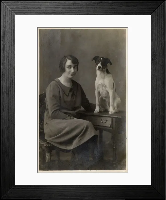 Framed Print : A lady and her dog pose for a studio portrait Framed Print : A lady and her dog pose for a studio portrait