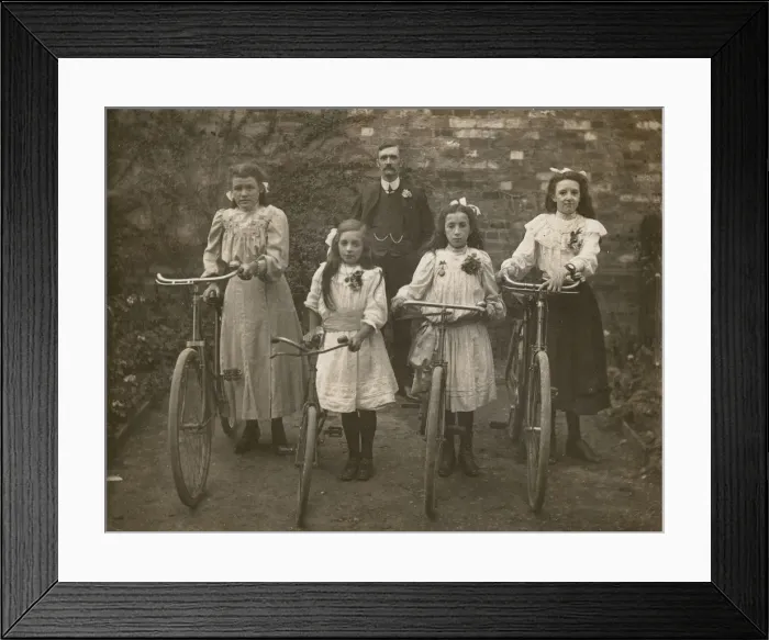Framed Print : Four Sisters stand proudly with their bicycles Framed Print : Four Sisters stand proudly with their bicycles