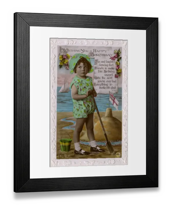 Framed Print : Little girl building patriotic sandcastle Framed Print : Little girl building patriotic sandcastle