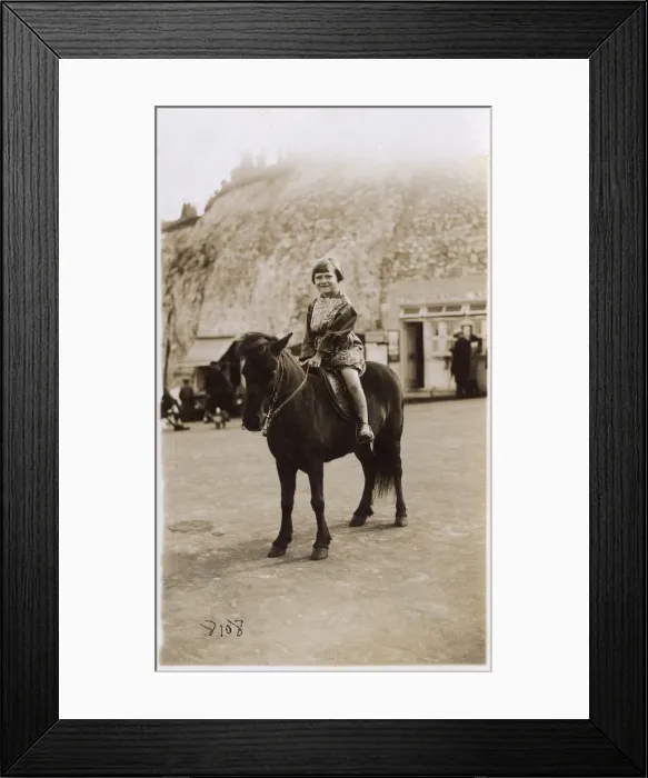 Framed Print : Young Girl on a pony - Margate, Kent Framed Print : Young Girl on a pony - Margate, Kent