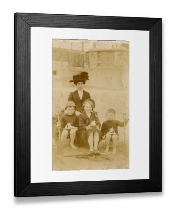 Framed Print : Mother and her three children, each holding a toy boat Framed Print : Mother and her three children, each holding a toy boat