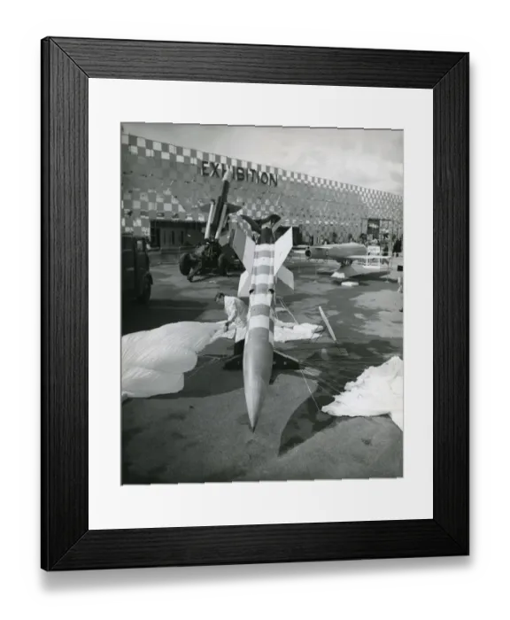 Framed Print : A test rocket used to demonstrate the parachute recover? Framed Print : A test rocket used to demonstrate the parachute recover?
