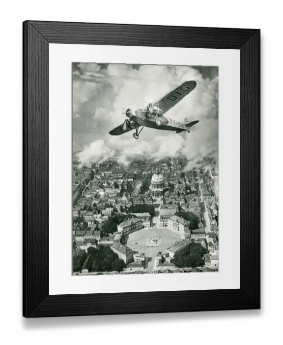 Framed Print : Fokker FXII, OY-DIG, over the castle of Amalienborg Framed Print : Fokker FXII, OY-DIG, over the castle of Amalienborg