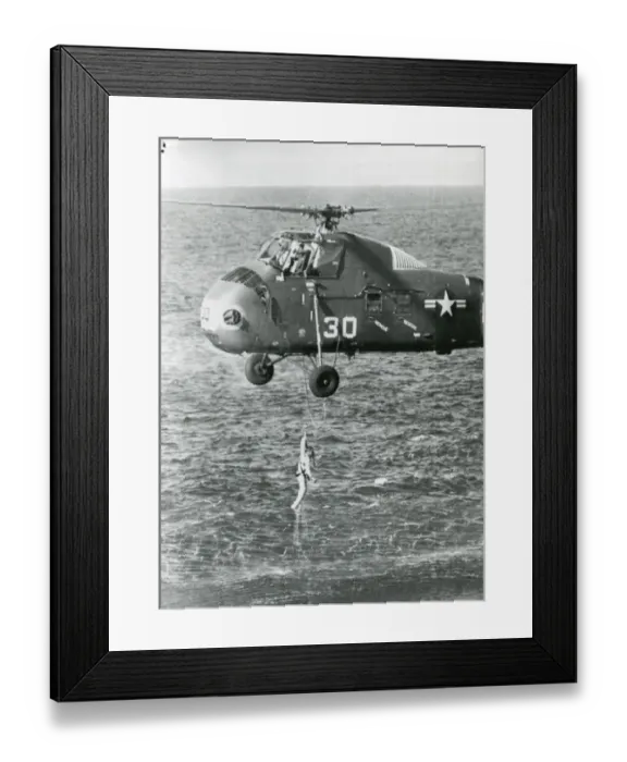 Framed Print : A US Marines helicopter lifts astronaut Virgil ?Gus? Gr? Framed Print : A US Marines helicopter lifts astronaut Virgil ?Gus? Gr?