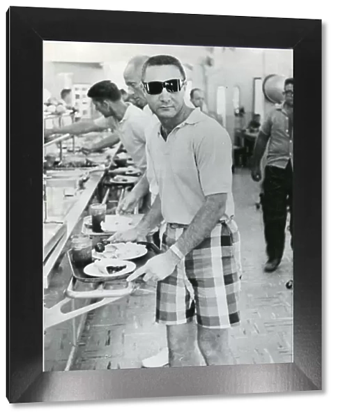 Astronaut Virgil ?Gus? Grissom in the chow line at the ?