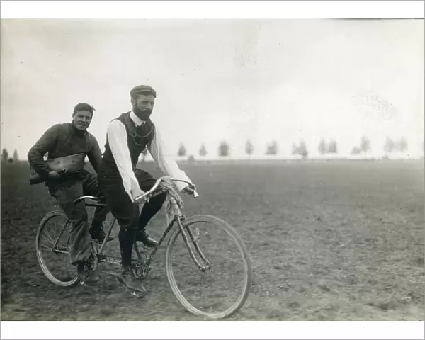 Henry Farman, 1874-1958, on the front of a tandem bicycle