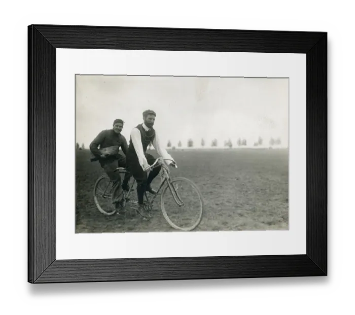 Framed Print : Henry Farman, 1874-1958, on the front of a tandem bicycle Framed Print : Henry Farman, 1874-1958, on the front of a tandem bicycle