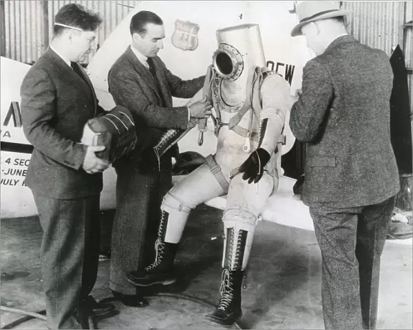 Wiley Post makes a final examination of his pressure suit