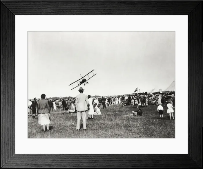 Framed Print : A Crowd of People Watching a Biplane Aircraft Flypast wi? Framed Print : A Crowd of People Watching a Biplane Aircraft Flypast wi?