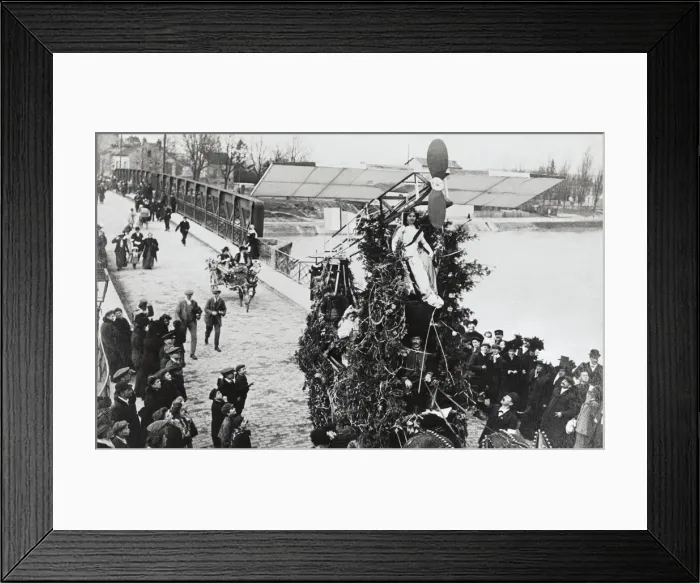 Framed Print : Crowd of People Watch As a Monplane Passes with Pilot on? Framed Print : Crowd of People Watch As a Monplane Passes with Pilot on?