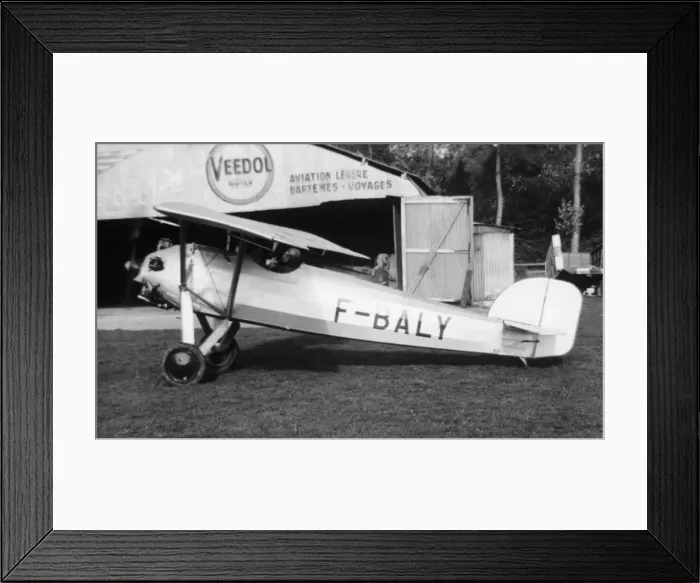 Framed Print : Morane-Soulnier Ms-181 Parasol Parked by a Hangar Framed Print : Morane-Soulnier Ms-181 Parasol Parked by a Hangar