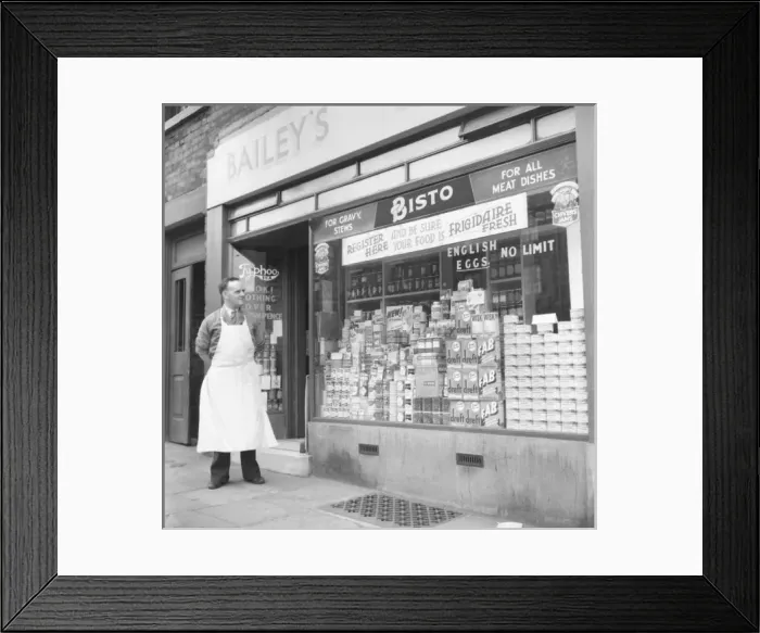 Framed Print : Baileys Grocery Store and shopkeeper Framed Print : Baileys Grocery Store and shopkeeper