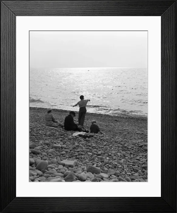 Framed Print : Skimming stones on a pebble beach Framed Print : Skimming stones on a pebble beach