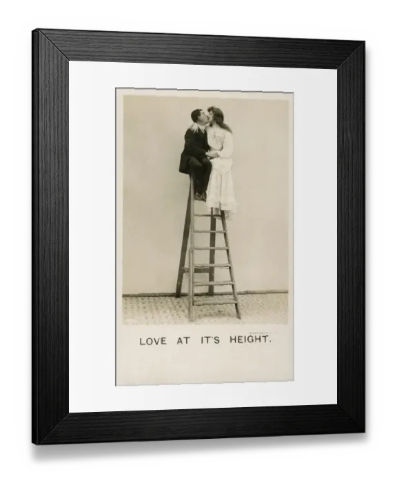 Framed Print : Love at its Height - a couple embrace at top of stepladder Framed Print : Love at its Height - a couple embrace at top of stepladder