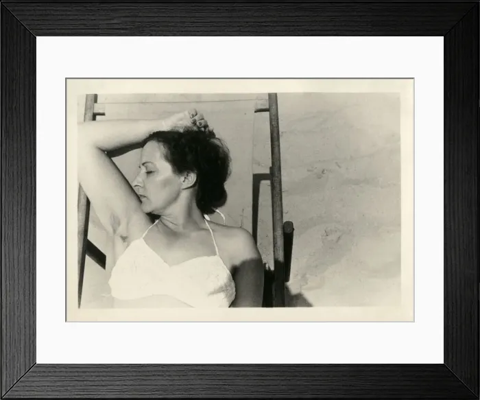 Framed Print : Sunbathing lady on a deckchair - British Seaside Coast Framed Print : Sunbathing lady on a deckchair - British Seaside Coast