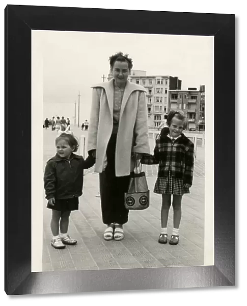 Mother and two children - Street Photograph - Belgium