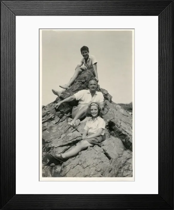 Framed Print : Family group photograph at the seaside - posing on a rock Framed Print : Family group photograph at the seaside - posing on a rock