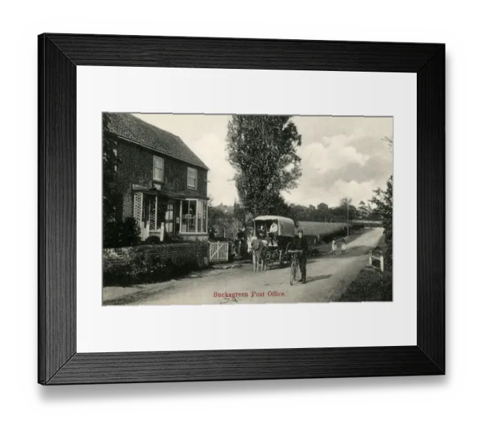 Framed Print : Bucks Green, West Sussex - The Post Office and local Postie Framed Print : Bucks Green, West Sussex - The Post Office and local Postie
