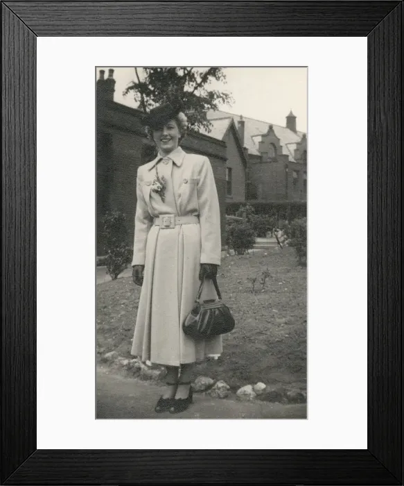 Framed Print : Stylish woman in an elegant coat and handbag Framed Print : Stylish woman in an elegant coat and handbag