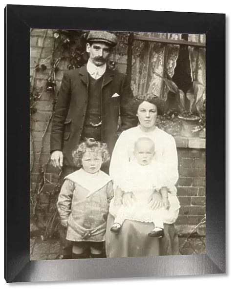 Working Class family in their Sunday Best Attire