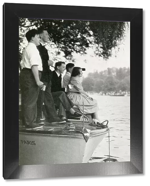 Group watching the Henley Regatta from boat, July 1958