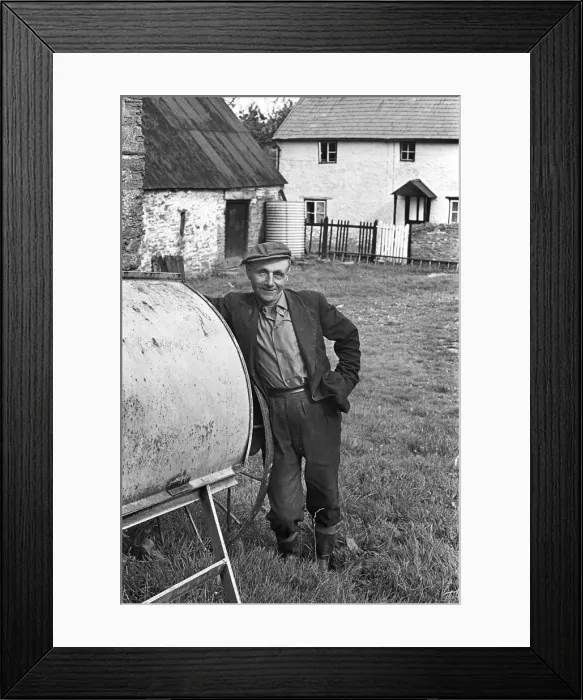 Framed Print : Farmer in farmyard, Herefordshire Framed Print : Farmer in farmyard, Herefordshire