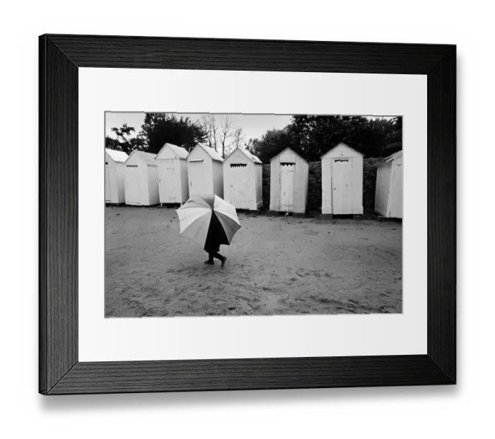 Framed Print : Child with umbrella, Brittany, France Framed Print : Child with umbrella, Brittany, France