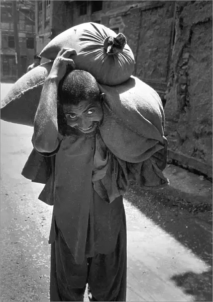 Man with sack, Kashmir
