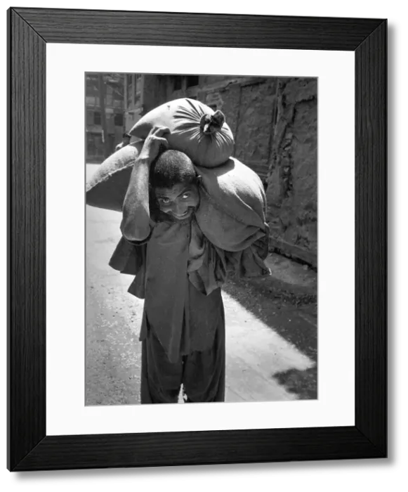 Framed Print : Man with sack, Kashmir Framed Print : Man with sack, Kashmir