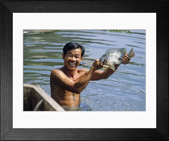 Framed Print : Man with fish, Bangkok Framed Print : Man with fish, Bangkok