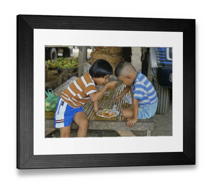 Framed Print : Children sharing a meal, Bangkok Framed Print : Children sharing a meal, Bangkok
