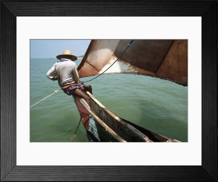 Framed Print : Sri Lankan fisherman in outrigger boat - 1 Framed Print : Sri Lankan fisherman in outrigger boat - 1