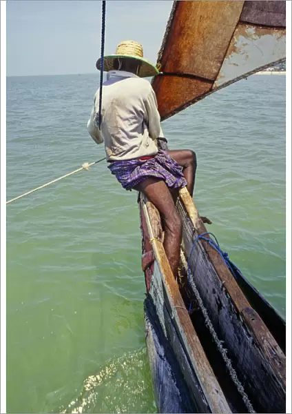 Sri Lankan fisherman in outrigger boat - 3
