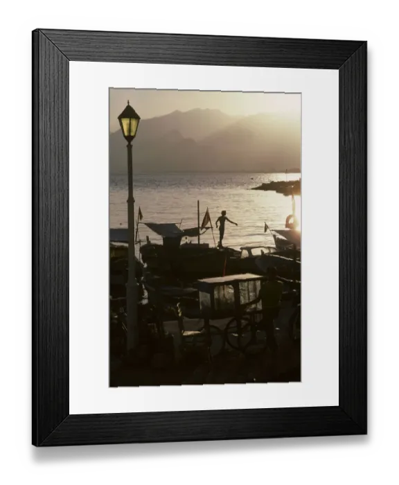Framed Print : Boy on harbour wall, Old Antalya Framed Print : Boy on harbour wall, Old Antalya