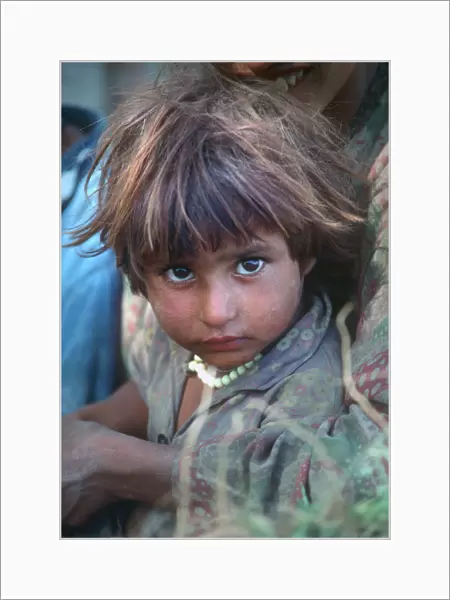Portrait of Kashmiri child with brown eyes