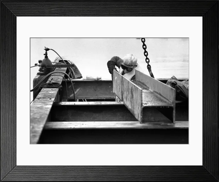 Framed Print : Docklands development, London, England - a welder at work Framed Print : Docklands development, London, England - a welder at work